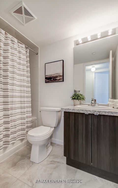 Photo 17 at 61 - 300 Alex Gardner Circle, Aurora Village, Aurora