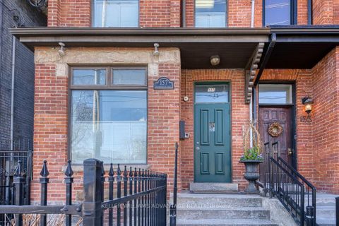 Photo 1 at 157 Gerrard Street E, Moss Park, Toronto