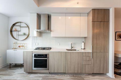 Photo 4 at 219 - 38 Howard Park Avenue, Roncesvalles, Toronto