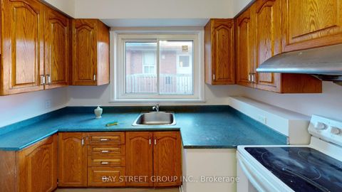 Photo 3 at 106 Wye Valley Road, Dorset Park, Toronto