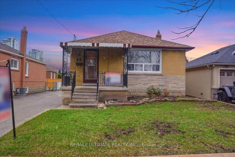 Photo 1 at 48 Savona Drive, Alderwood, Toronto