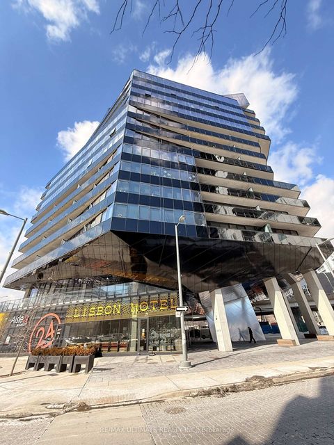 Photo 2 at 19 Lawren Harris Square, Moss Park, Toronto