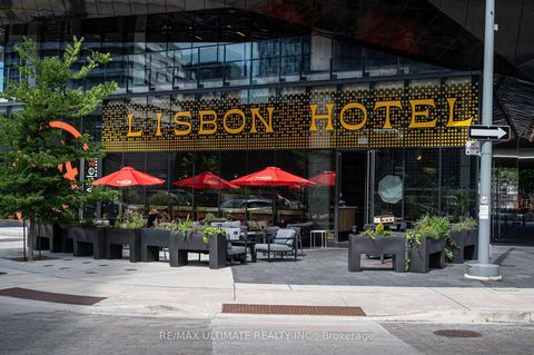 Photo 3 at 19 Lawren Harris Square, Moss Park, Toronto