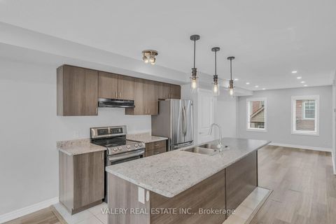 Photo 2 at 65 - 2500 Hill Rise Court, Windfields, Oshawa