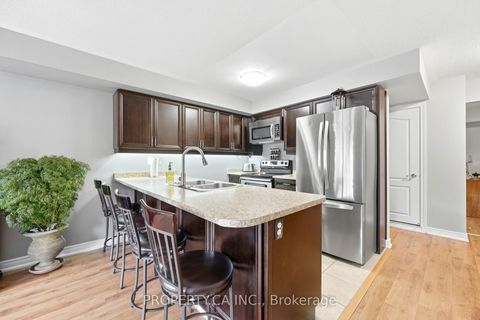 Photo 10 at 6 - 157 Isaac Devins Boulevard, Pelmo Park W5, Toronto