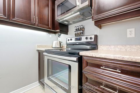 Photo 14 at 6 - 157 Isaac Devins Boulevard, Pelmo Park W5, Toronto