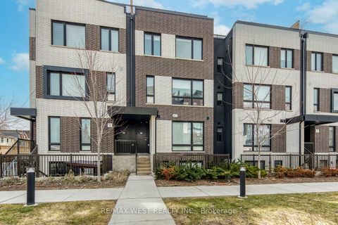 Photo 1 at 14 - 20 Ed Clark Gardens, Pellam Park, Toronto