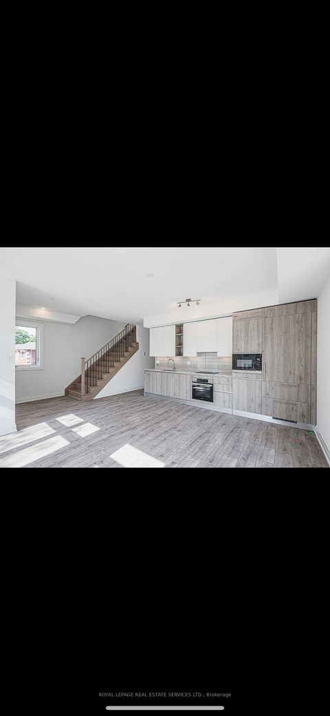 Photo 5 at 23 - 28 Marina Avenue, Long Branch, Toronto