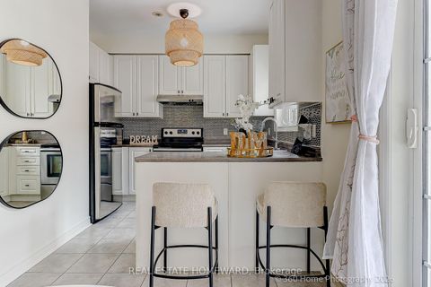 Photo 4 at 12 Carnahan Terrace, Danforth, Toronto