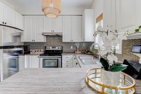 Photo 5 at 12 Carnahan Terrace, Danforth, Toronto