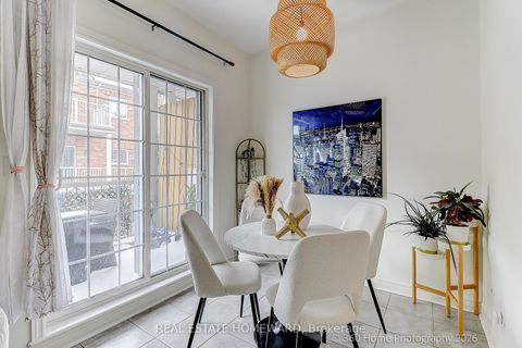 Photo 7 at 12 Carnahan Terrace, Danforth, Toronto