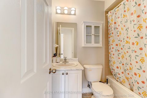 Photo 13 at 12 Carnahan Terrace, Danforth, Toronto