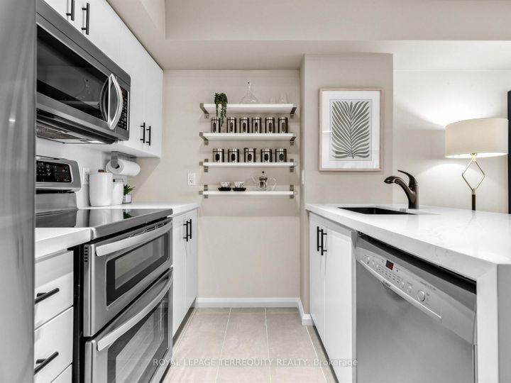 Photo 10 at 301 - 60 Joe Shuster Way, South Parkdale, Toronto