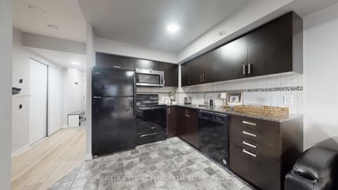 Photo 4 at 617 - 30 Meadowglen Place, Woburn, Toronto