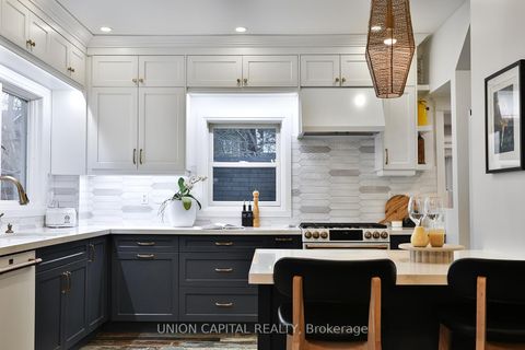 Photo 10 at 77 Eastwood Road, Woodbine Corridor, Toronto