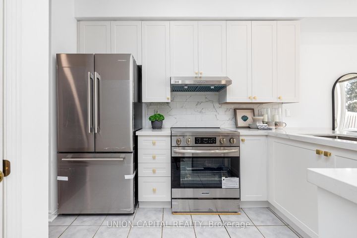 Photo 15 at 29 Queen's Plate Drive, Angus Glen, Markham