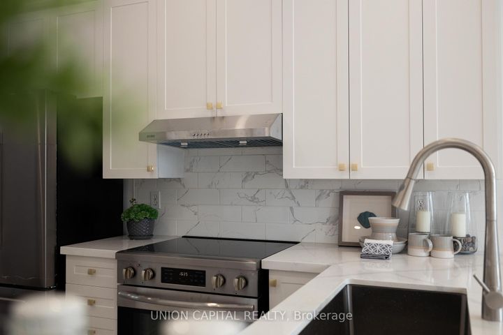 Photo 20 at 29 Queen's Plate Drive, Angus Glen, Markham