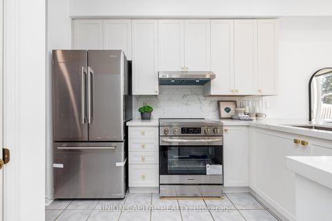 Photo 15 at 29 Queen's Plate Drive, Angus Glen, Markham