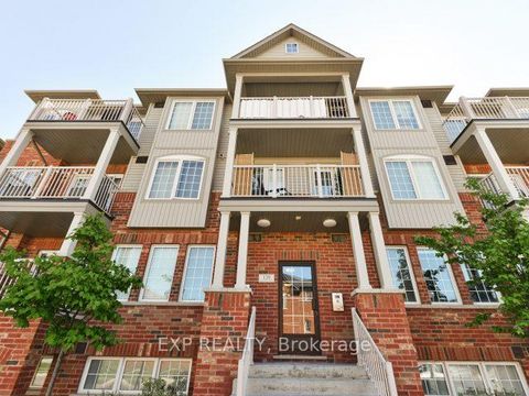 Photo 1 at 7 - 129 Isaac Devins Boulevard, Pelmo Park W5, Toronto