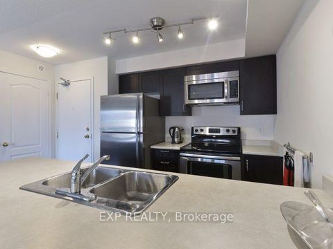 Photo 10 at 7 - 129 Isaac Devins Boulevard, Pelmo Park W5, Toronto