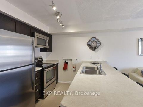 Photo 11 at 7 - 129 Isaac Devins Boulevard, Pelmo Park W5, Toronto