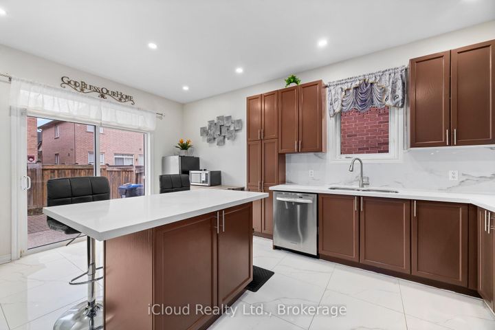 Photo 15 at 75 Iron Block Drive, Northwest Sandalwood Parkway, Brampton