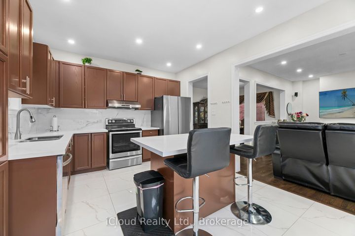 Photo 17 at 75 Iron Block Drive, Northwest Sandalwood Parkway, Brampton