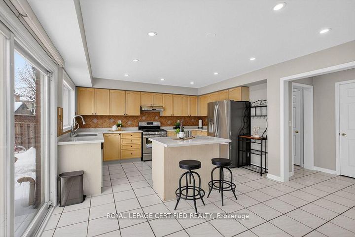 Photo 12 at 10 Verona Drive, Vales of Castlemore, Brampton