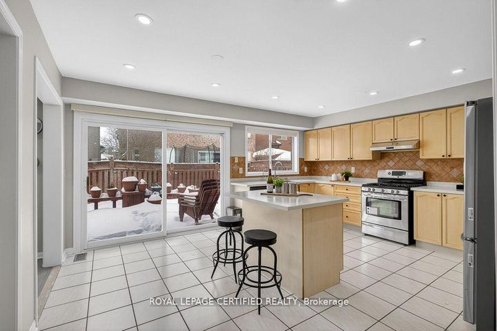 Photo 13 at 10 Verona Drive, Vales of Castlemore, Brampton