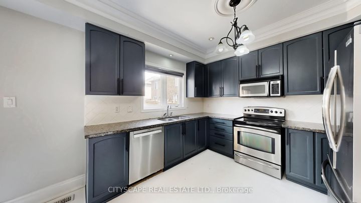 Photo 8 at 7 Yellow Avens Boulevard, Wellington, Brampton