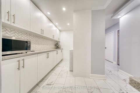 Photo 8 at 2014 - 320 Dixon Road, The Westway, Toronto