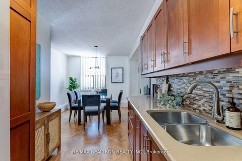 Photo 4 at 404 - 90 Ling Road, West Hill, Toronto