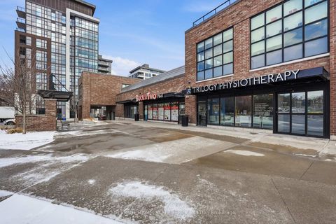 Photo 2 at 10 Neighbourhood Lane, Queensway, Toronto