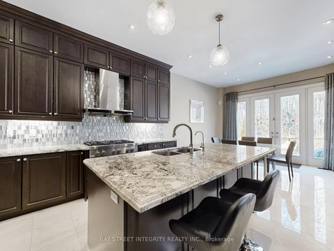 Photo 8 at 57 Strawbridge Farm Drive, Aurora Grove, Aurora