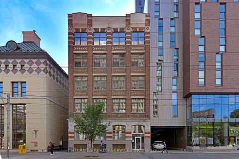 Photo 0 at 243 College Street, Chinatown, Toronto