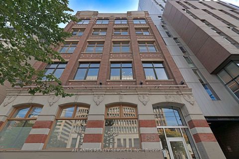 Photo 1 at 243 College Street, Chinatown, Toronto