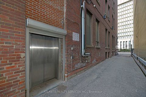 Photo 3 at 243 College Street, Chinatown, Toronto