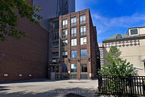 Photo 4 at 243 College Street, Chinatown, Toronto