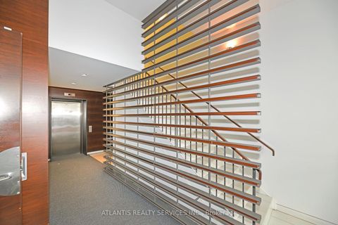 Photo 6 at 243 College Street, Chinatown, Toronto