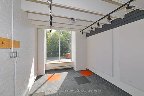 Photo 7 at 243 College Street, Chinatown, Toronto