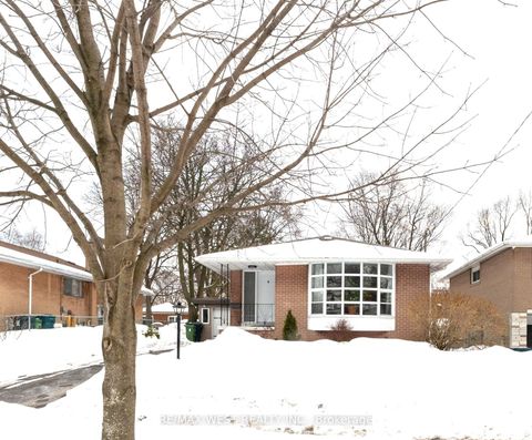 Photo 1 at 57 Alpaca Drive, Woburn, Toronto