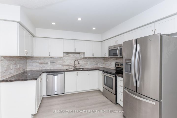 Photo 12 at 16 - 2460 Post Road, RO River Oaks, Oakville