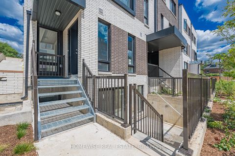 Photo 3 at TH8 - 20 Ed Clark Gardens, Pellam Park, Toronto