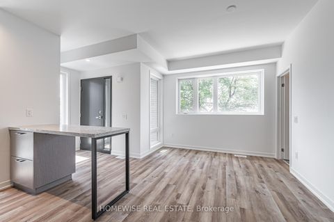 Photo 8 at TH8 - 20 Ed Clark Gardens, Pellam Park, Toronto