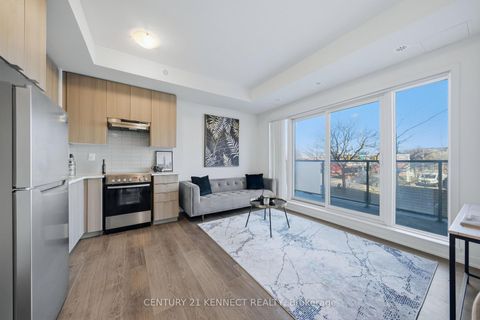 Photo 3 at 211 - 20 Orchid Court, Windfields, Toronto