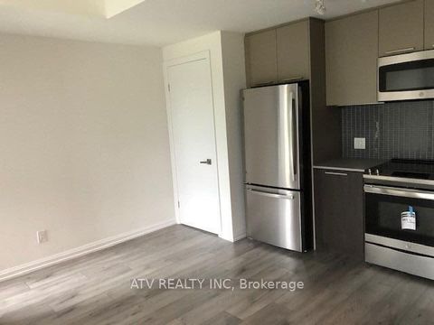 Photo 3 at TH17 - 10 Brin Drive, Humber Valley, Toronto