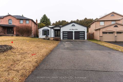 Photo 1 at 124 Timpson Drive, Aurora Highlands, Aurora