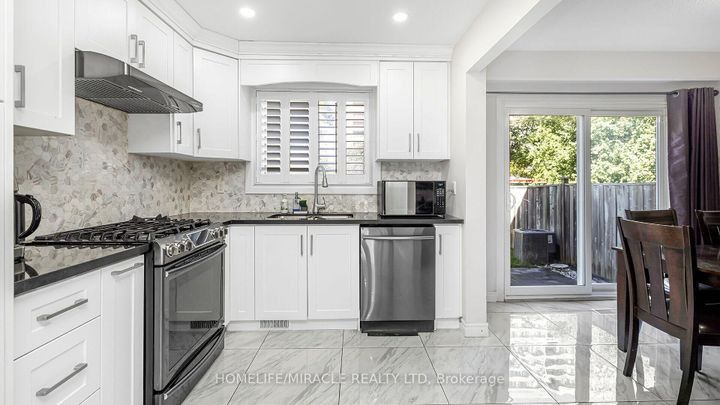 Photo 49 at 52 - 1290 Bridletowne Circle, L'Amoreaux, Toronto