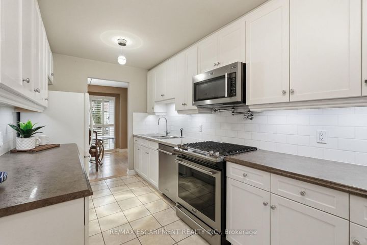 Photo 4 at 45 - 1228 Kirstie Court, CP College Park, Oakville