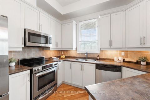 Photo 12 at 14 Fairhead Mews, Danforth, Toronto